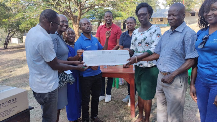 A cheque of KES173,000.00 donated by Rotary Club of Milimani